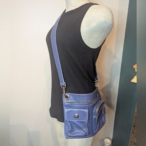 ROOTS CANADA Tribe Village crossbody purple leather bag. Medium